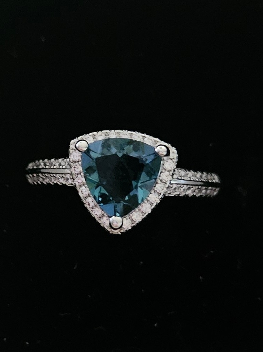 Silver-Plated Ring with Deep Teal Trillion Stone and Pave Halo